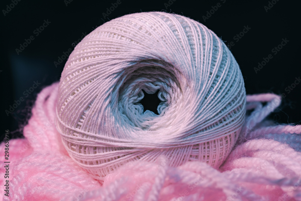 Poster close up beautiful tangle of thread in red and blue light on a dark background. macro photography vi
