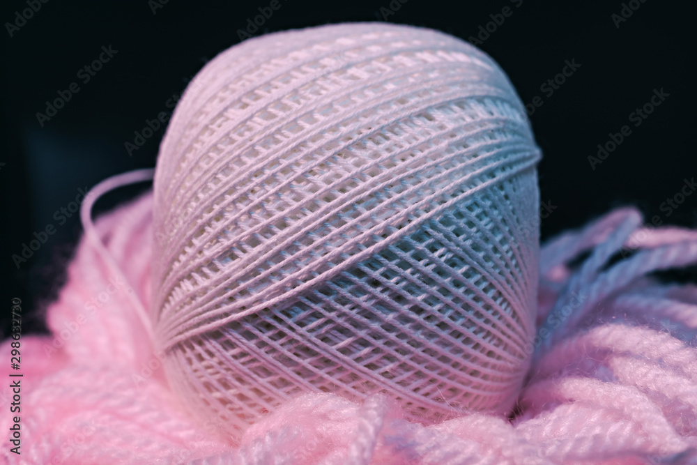 Poster close up beautiful tangle of thread in red and blue light on a dark background. macro photography vi