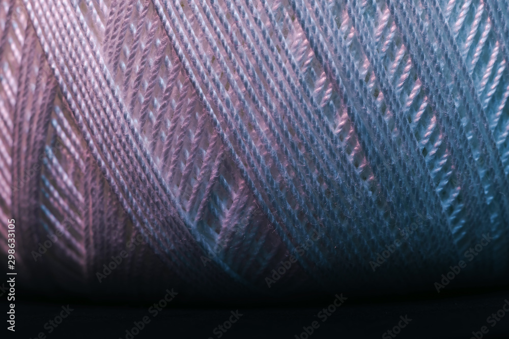 Poster close up beautiful white thread in red and blue light background texture. macro photography view.