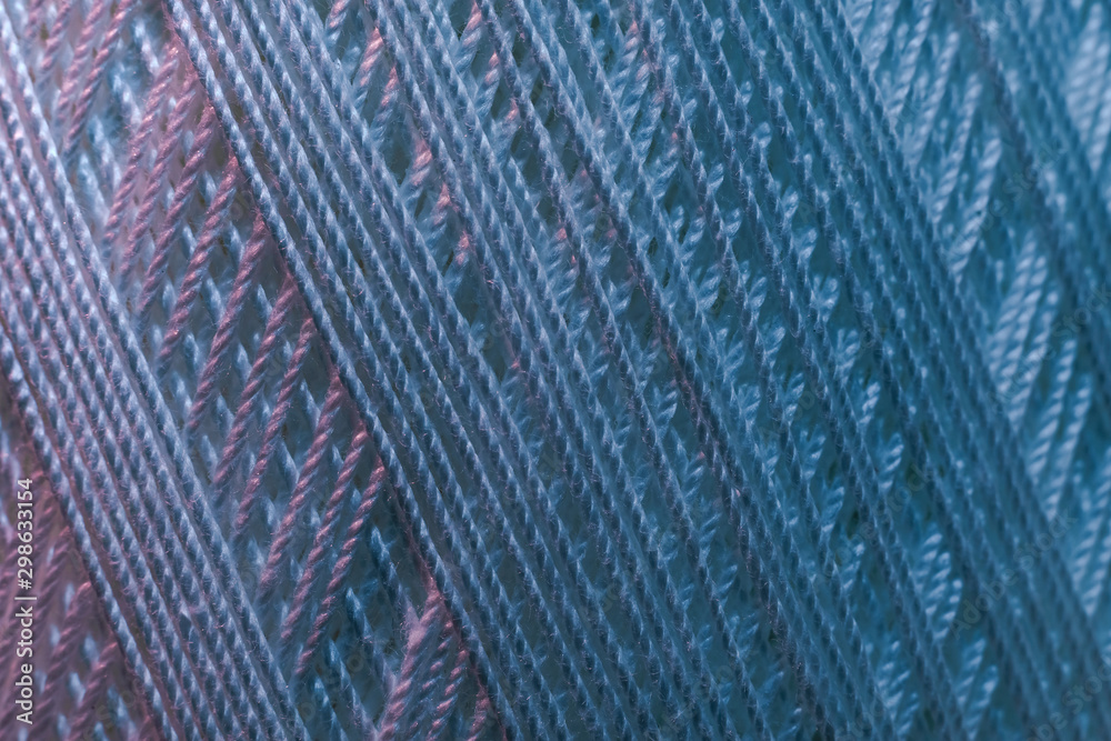 Poster close up beautiful white thread in red and blue light background texture. macro photography view.