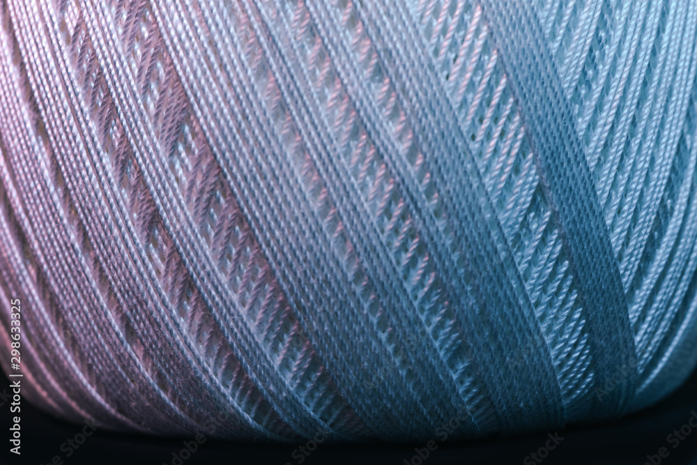 Poster Close up beautiful tangle of thread in red and blue light background texture. Macro Photography view.