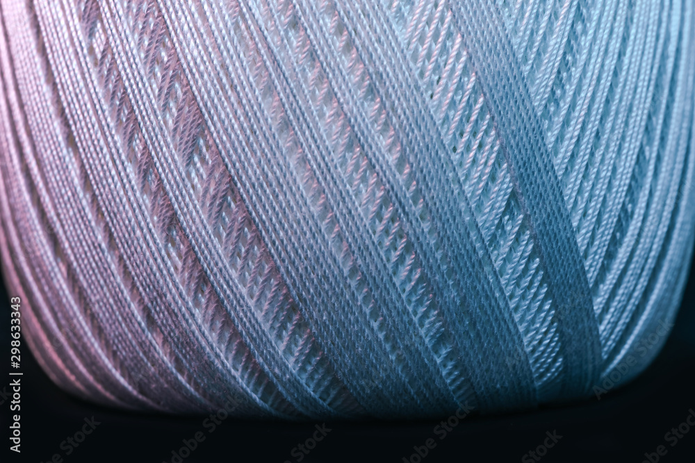 Poster Close up beautiful tangle of thread in red and blue light background texture. Macro Photography view.