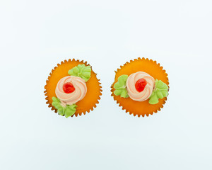 Top view image cupcakes on white background,