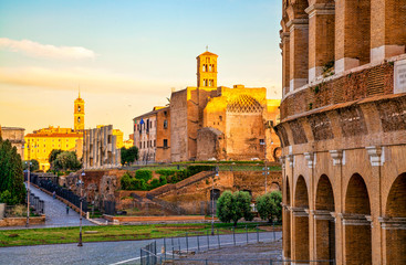 Fototapeta premium Arch of Constantine, Colosseum and Roman Forum in Rome, Italy. Triumphal arch in Rome, Italy. North side, from the Colosseum.