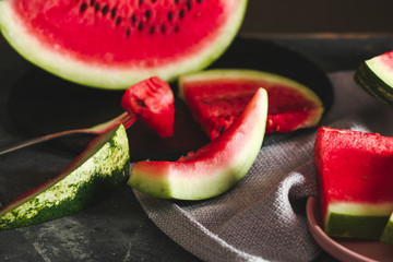 Sweet cut watermelon on dark background