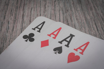 Playing cards in hand on the table, poker nands