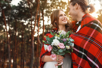 Happy couple celebrating their wedding outdoors