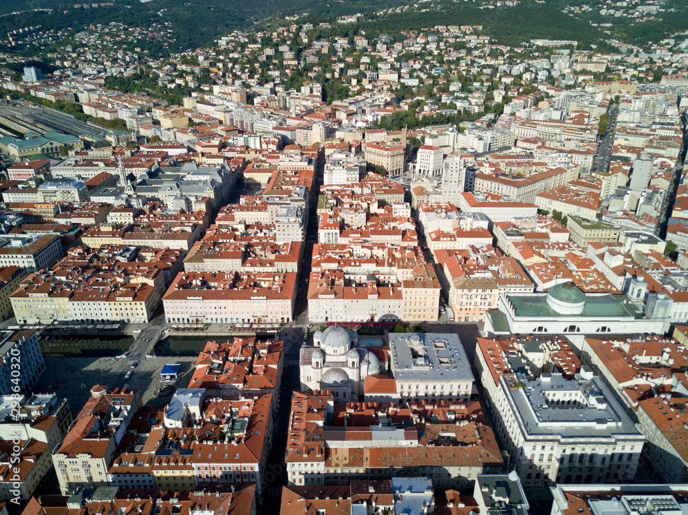 Wall mural aerial video shooting with drone on trieste, a famous italy city, important hub of maritime trade an