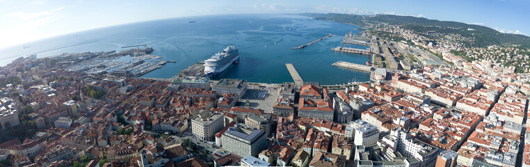 Aerial video shooting with drone on Trieste, a famous Italy city, important hub of maritime trade and tourist art - obrazy, fototapety, plakaty