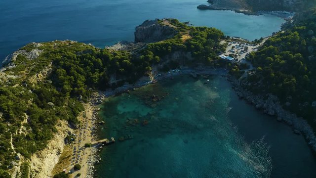 Aerial above cliffs to beautiful Anthony Quinn Beach on rhodes island.