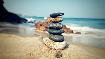 stack of stones on the beach
