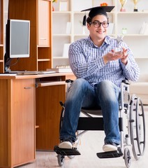 Disabled student studying at home on wheelchair