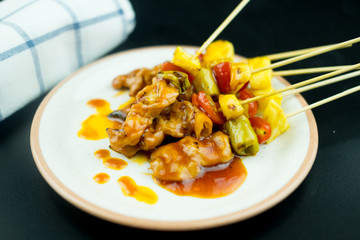 Chicken bbq with with tomatoes, pineapple and paprika peppers