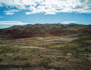 Fototapeta premium Awesome images of the colorful well preserved John Day Fossil Beds Painted Hills Overlook Area in Mitchell, Oregon.
