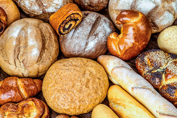 Fresh fragrant bread on the table. Food concept