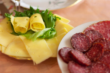cheese and sausages breakfast closeup tasty plate
