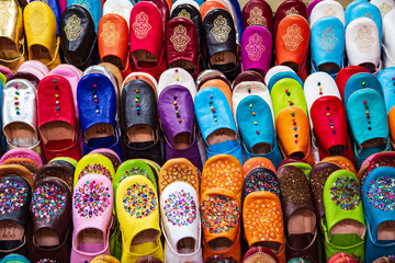 Traditional vibrant Moroccan slippers - "babouches" on the market.