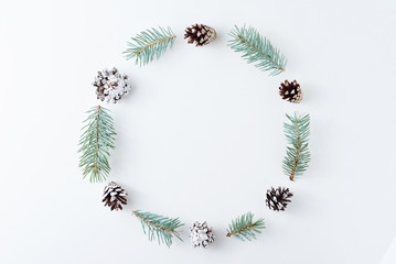 Fototapeta na wymiar Christmas background made of pine cones and fir tree