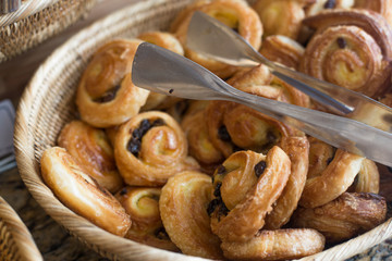 Cinnamon danish bun in the basket