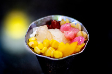 Ice water and fruits are sweet dessert of eating fresh feeling