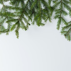 Obraz premium branches on a white table. Christmas and New Year concept. Coffee art. Flat lay, top view. Instagram style