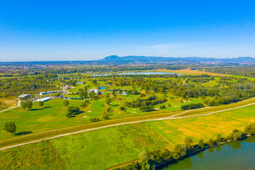 Obraz premium Aerial drone view of green nature in golf club, sunny summer day, Zagreb, Croatia 