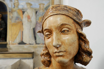 Bust of Raffaello Sanzio, known as Raphael. On the background there is a fresco painted by Raffaello Sanzio. Chapel of San Severo, Perugia, Italy - obrazy, fototapety, plakaty
