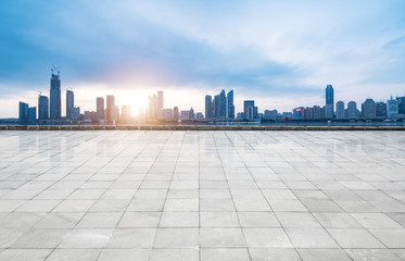 Obraz premium Panoramic skyline and buildings with empty concrete square floor,qingdao,china