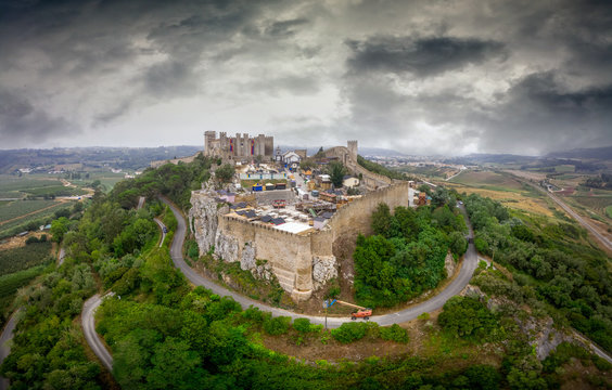 Aerial view of Obidos castle and walled medieval town in Central Portugal one of the seven wonders of Portugal with a pousada luxury hotel popular tourist destination
