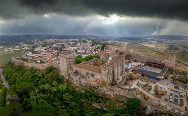 Fototapeta na wymiar Aerial view of Obidos castle and walled medieval town in Central Portugal one of the seven wonders of Portugal with a pousada luxury hotel popular tourist destination