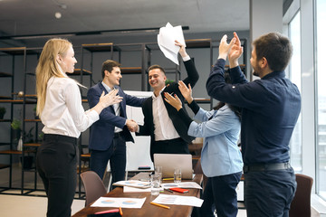 happy business people shaking hands , have signed a successful concluded deal. Teamwork concept....