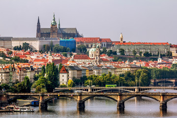 Fototapeta na wymiar View of the bridges over the Vltava and Prague castle in Prague.