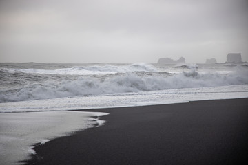 Storm at Black beach of Dyrholaey, Vik, Iceland