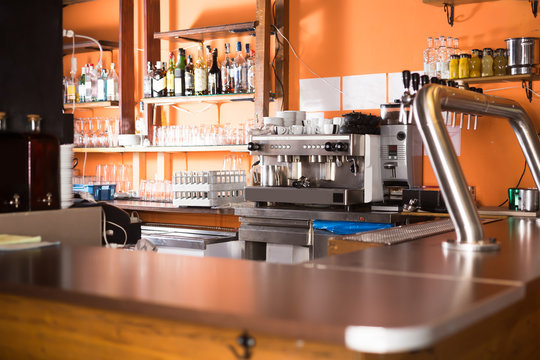 Image of modern beer bar with  metal beer taps