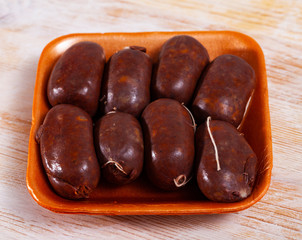 Morcilla on plastic tray