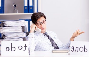 Businessman working on his to-do list