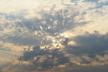 Beautiful dark clouds in the sky at sunset, natural background