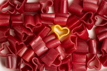 Colorful heart shape macaroni pasta