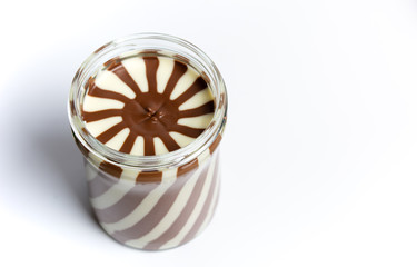 Sweet cream in the jar isolated