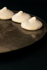 Meringue on a Tray Dark Background