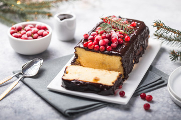 Christmas breakfast. Cottage  cake with cranberries and New year  decorations on a light background.