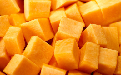 chopped pumpkin lies in a pan