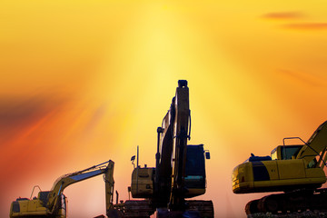 excavator at sunset
