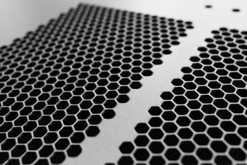 Close-up, shallow focus of a meshed style cooling panel used on a main frame computer, housed in a ...