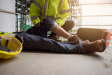 Close up leg of worker accident in site work, Basic first aid training for support accident in site...