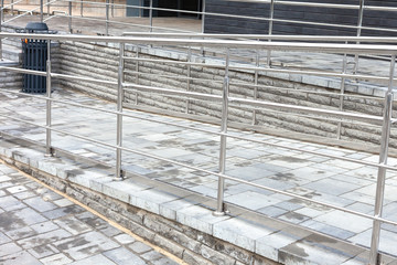 Chromium metal fence with handrail.