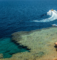 Chairs umbrellas mountains red sea Egypt top view