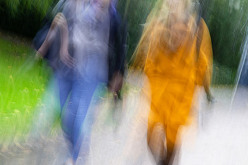 two female persons with yellow and blue clothes