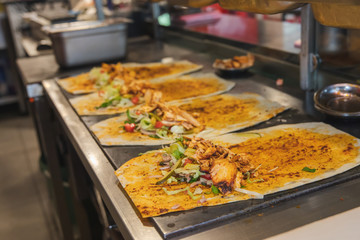 Traditional Turkish Doner Kebab meat. Shawarma or gyros. Turkish, greek or middle eastern arab style chicken doner kebab food in restaurant.