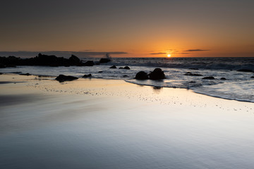 Waves in sunset